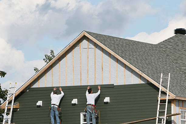 Professional Siding Replacement technician working in USA